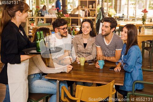 Image of Talking to the waitress