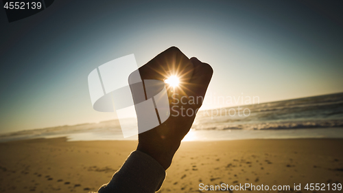 Image of Holding sun