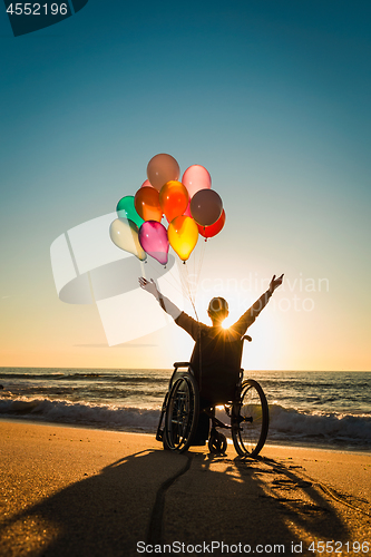 Image of Woman on a wheelchair