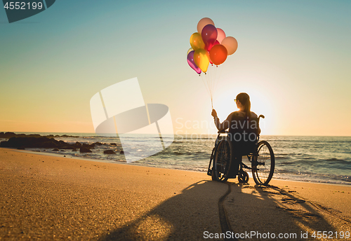 Image of Woman on a wheelchair