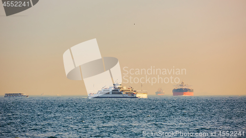 Image of Large cargo container ship passing through Bosphorus, Istanbul, Turkey.