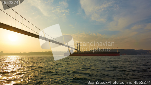 Image of Turkey, Istanbul, Bosphorus Channel, Bosphorus Bridge, an cargo ship under the Bridge.