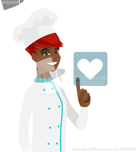 Image of Young african chef pressing web button with heart.