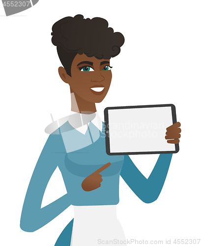 Image of Young african cleaner holding tablet computer.