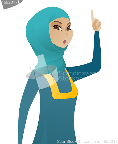Image of Business woman with open mouth pointing finger up.