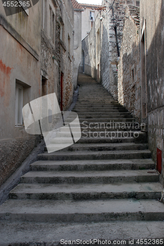 Image of Old stone stairs on the street in Blato, Croatia