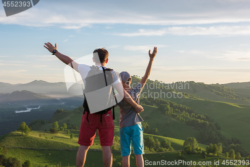 Image of Happy father and son in the Altai mountains