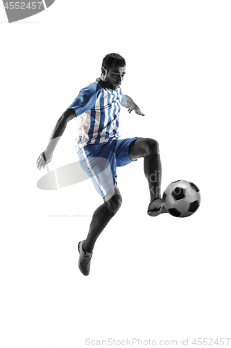 Image of Professional football soccer player with ball isolated on white background
