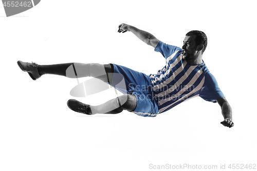 Image of Professional football soccer player in action isolated on white background