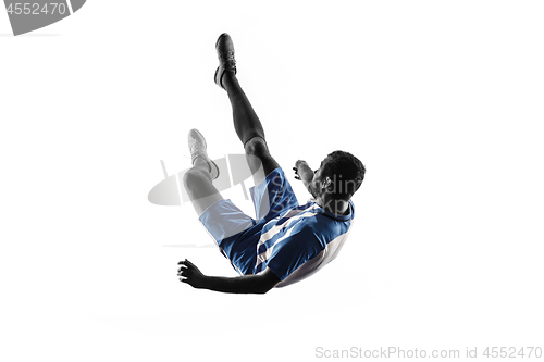 Image of Professional football soccer player in action isolated on white background