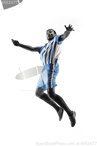 Image of Professional football soccer player in action isolated on white background