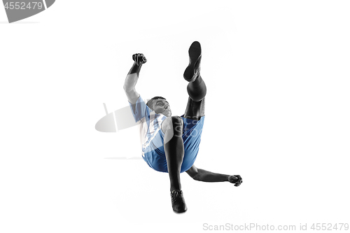 Image of Professional football soccer player in action isolated on white background