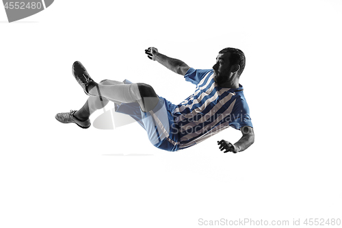 Image of Professional football soccer player in action isolated on white background