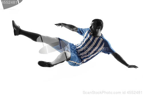 Image of Professional football soccer player in action isolated on white background