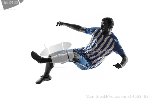 Image of Professional football soccer player in action isolated on white background