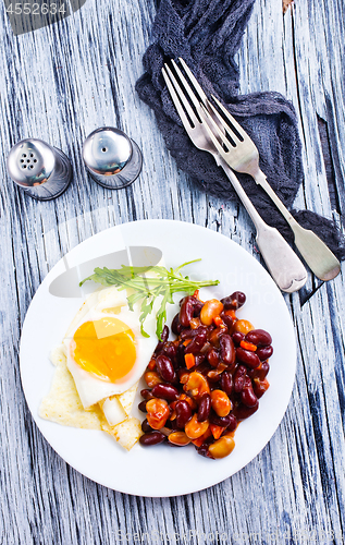 Image of fried bean with fried eggs