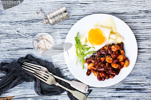 Image of fried bean with fried eggs