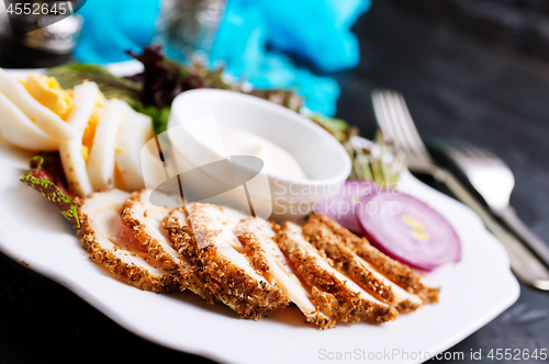 Image of chicken fillet on plate