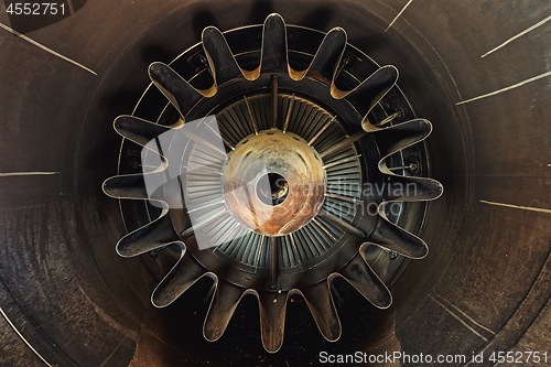Image of Rusty old jet engine closeup as background