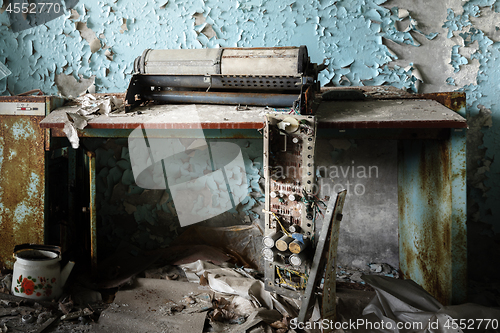 Image of Damaged machinery on table