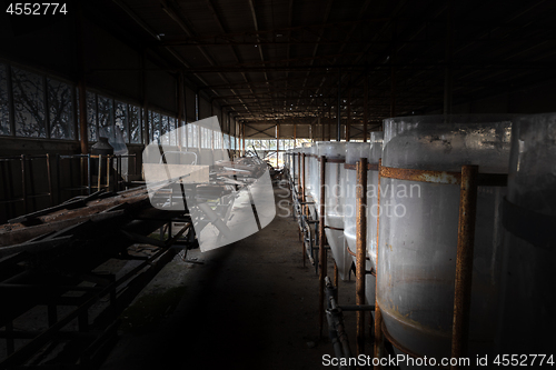 Image of Abandoned industrial interior with breeding tanks