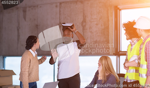 Image of group of multiethnic business people on construction site