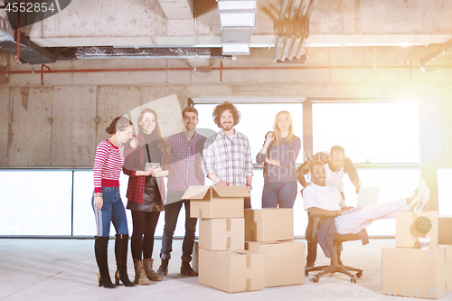 Image of portrait of multiethnic business people with sunlight through th