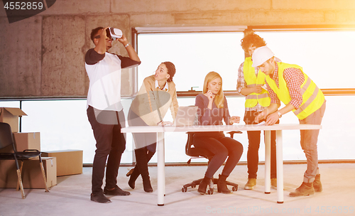 Image of group of multiethnic business people on construction site