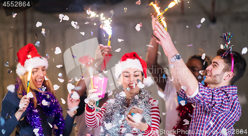 Image of multiethnic group of casual business people taking selfie during