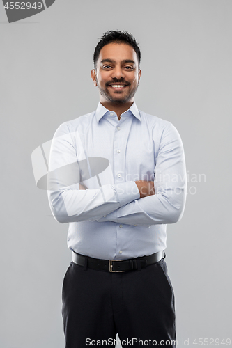 Image of indian businessman in shirt over grey background