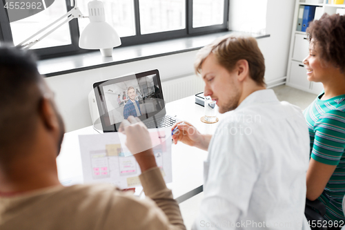 Image of creative team having video conference at office