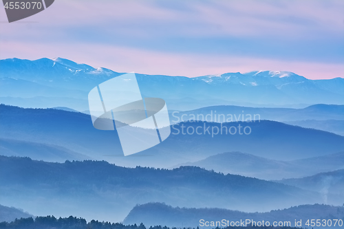 Image of Mountain Ranges in The Fog