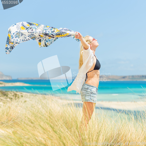 Image of Free Happy Woman Enjoying Sun on Vacations.