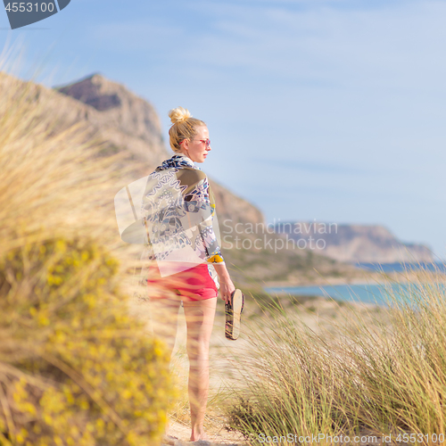 Image of Free Happy Woman Enjoying Sun on Vacations.