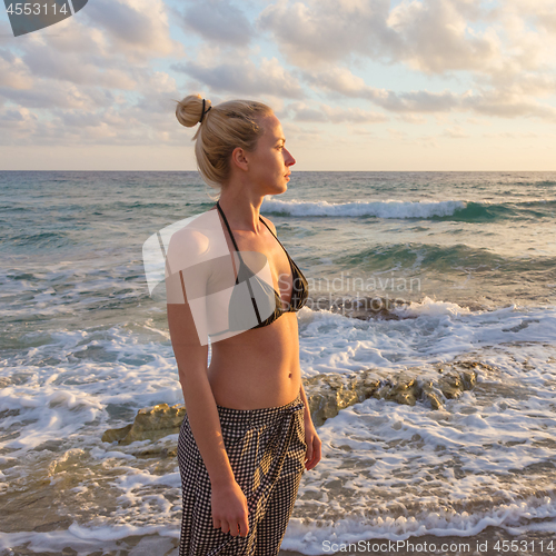 Image of Relaxed Happy Woman Enjoying Sun on Vacations.