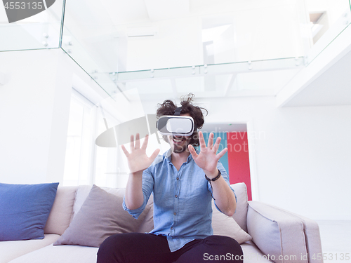 Image of man using VR-headset glasses of virtual reality