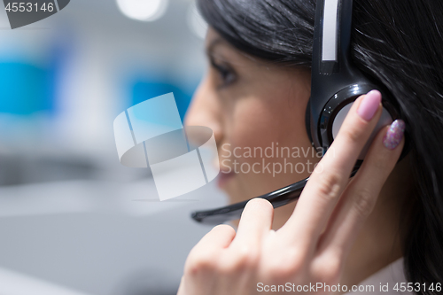 Image of female call centre operator doing her job