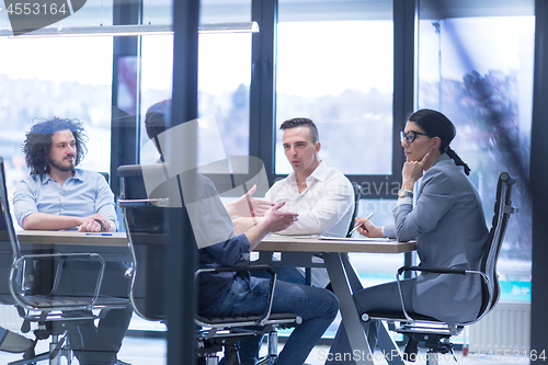 Image of Startup Business Team At A Meeting at modern office building