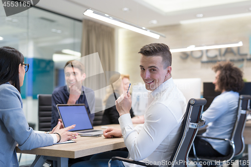 Image of Startup Business Team At A Meeting at modern office building