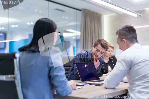 Image of Startup Business Team At A Meeting at modern office building