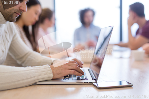 Image of Startup Business Team At A Meeting at modern office building