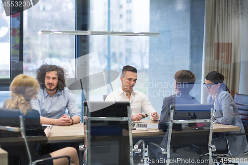 Image of Startup Business Team At A Meeting at modern office building