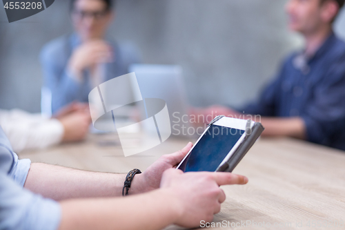 Image of businessman using tablet computer