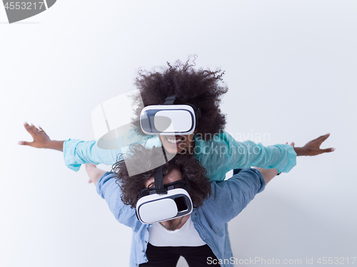 Image of multiethnic couple getting experience using VR headset glasses