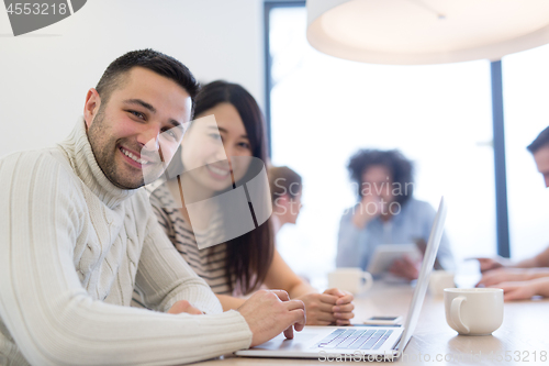 Image of Startup Business Team At A Meeting at modern office building