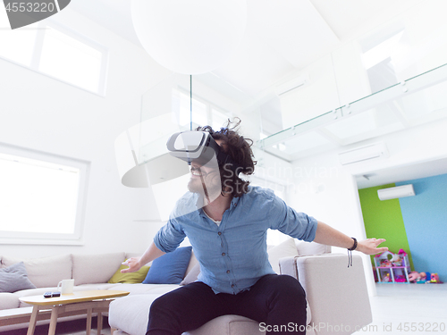 Image of man using VR-headset glasses of virtual reality