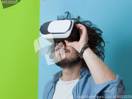 Image of man using VR headset glasses of virtual reality