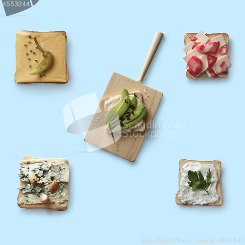 Image of different sandwiches on a blue background