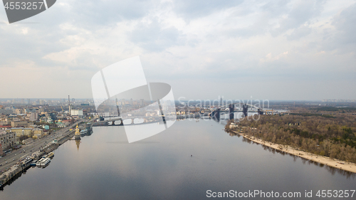 Image of The embankment near the river port, Church of St. Nicholas the Wonderworker in the waters , Havanskyi and Podolsky bridges in Kiev city Ukraine.