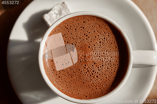 Image of a cup of turkish coffee with foam